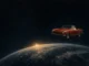 Red Tesla Roadster with the Starman mannequin in a spacesuit above the curve of the Earth